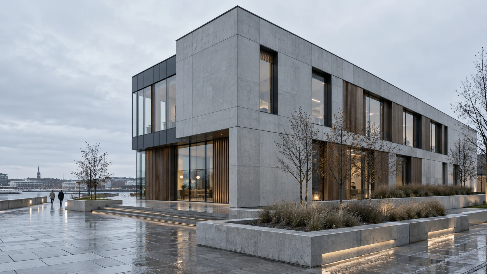 Contemporary Scandinavian waterfront building with pale façade panels and warm timber accents